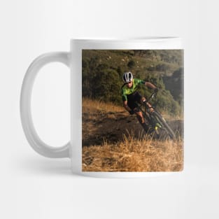 Mountain Biker riding a single track at sunset Mug